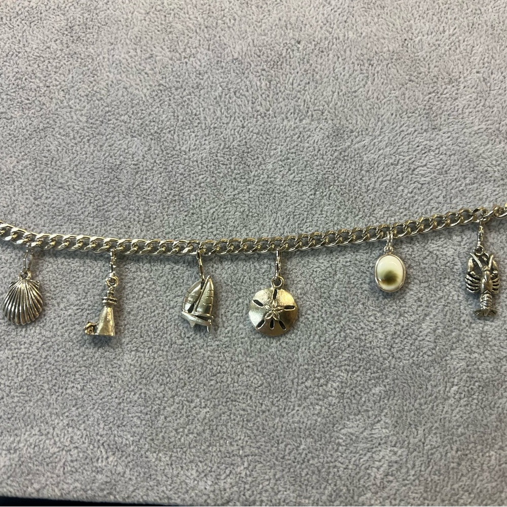 Nautical charm Bracelet lobster, lighthouse, sand dollar, sailboat, seashell.